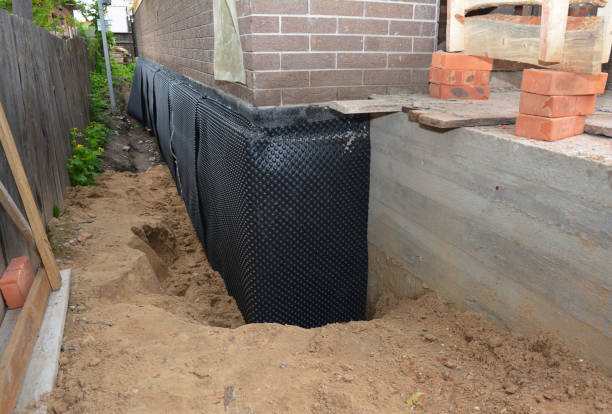 SJ Waterproofing Pros technician performing targeted Crawl Space Encapsulation assessment in Mishicot, WI